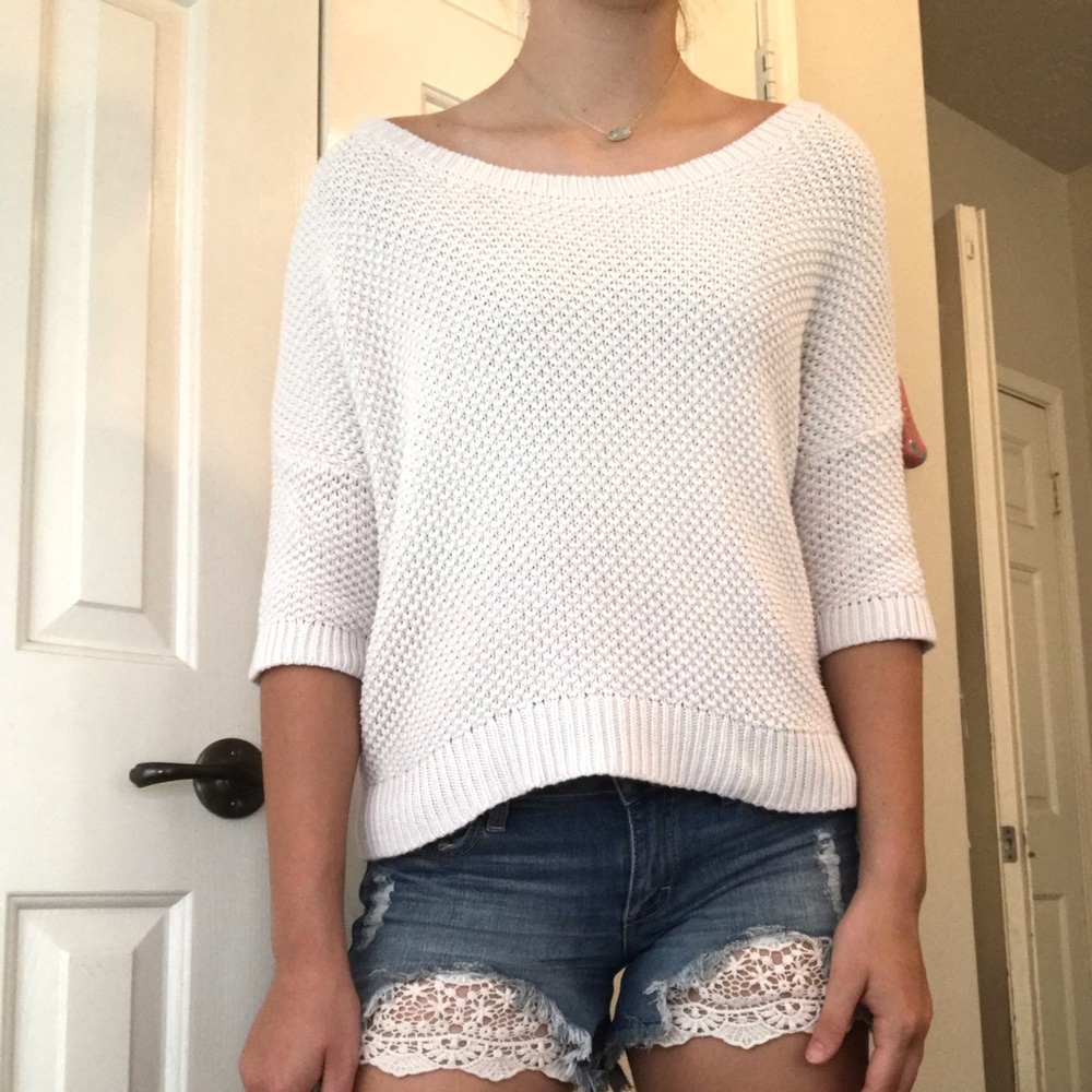 White knitted sweater